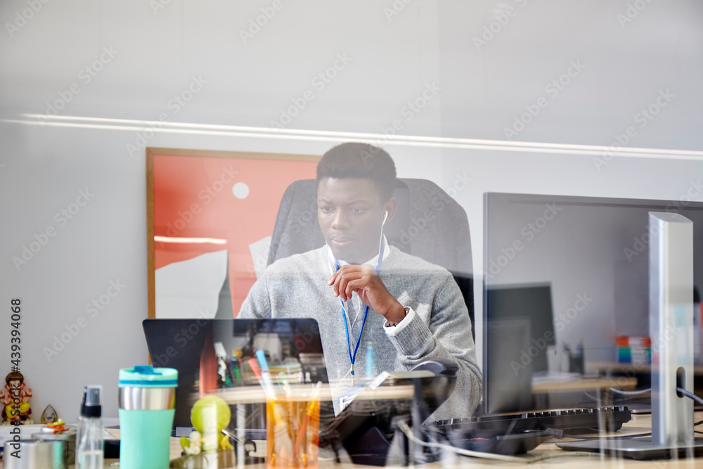 Entrepreneur working on laptop Entrepreneur working on laptop