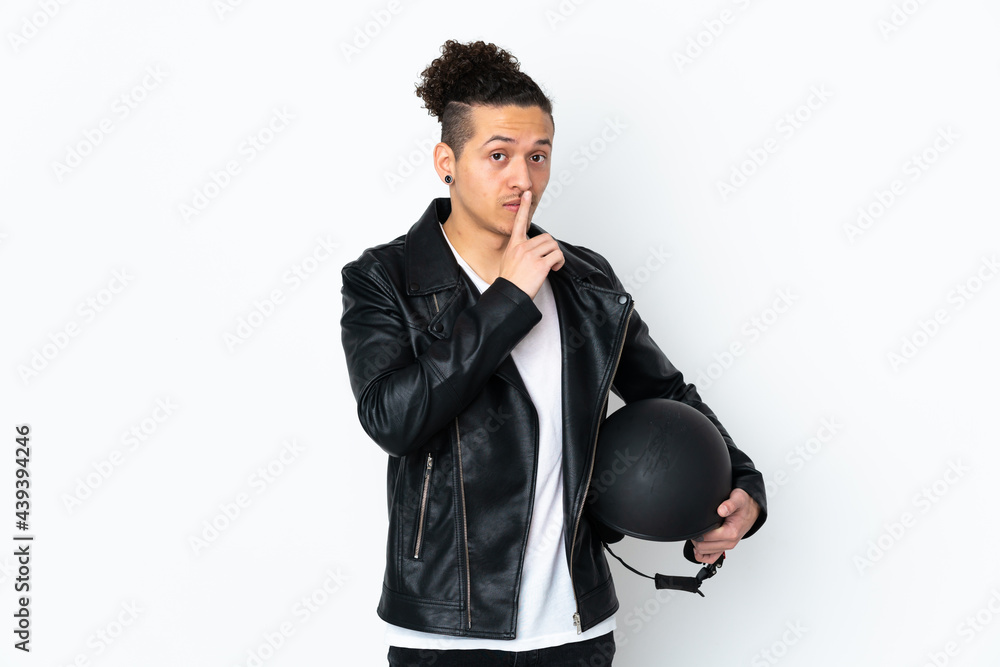 Caucasian man with a motorcycle helmet over isolated white background doing silence gesture Caucasian man with a motorcycle helmet over isolated white background doing silence gesture