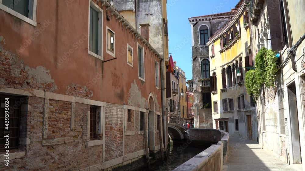 Venice, Italy - June 2021 - Walking through the less touristy streets of the lagoon city, among lesser-known canals, bridges and houses Venice, Italy - June 2021 - Walking through the less touristy streets of the lagoon city, among lesser-known canals, bridges and houses