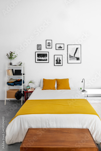 Spacious bedroom with minimalist furniture photo