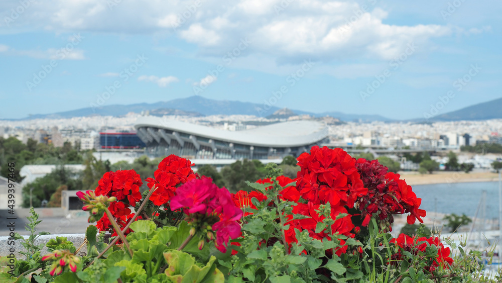 Famous bokeh photo with beautiful flowers in city of Piraeus, Attica, Greece