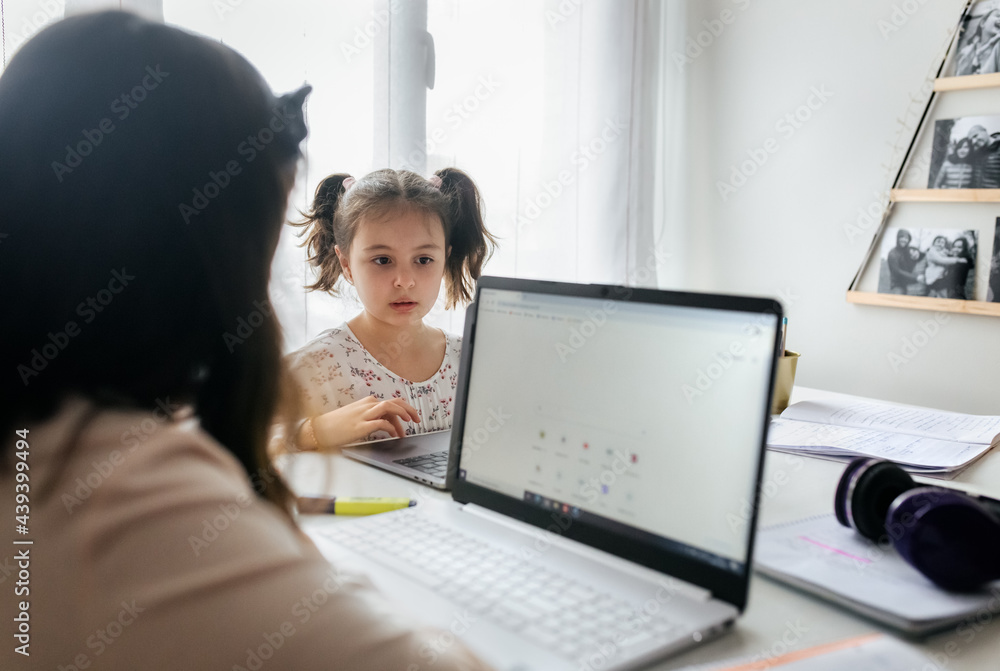 Girls studying at home Girls studying at home