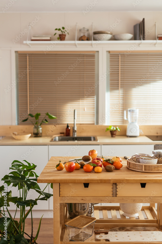 © BONNINSTUDIO/Stocksy - Modern kitchen with food and kitchenware