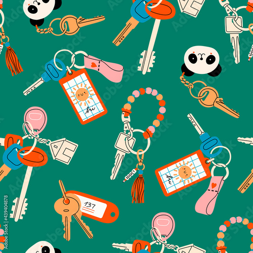 Various Keys with different Keychains. Keyholders and keyrings collection. Modern keys with pendants. Hand drawn Vector seamless Pattern. Green background. Wrapping, textile template