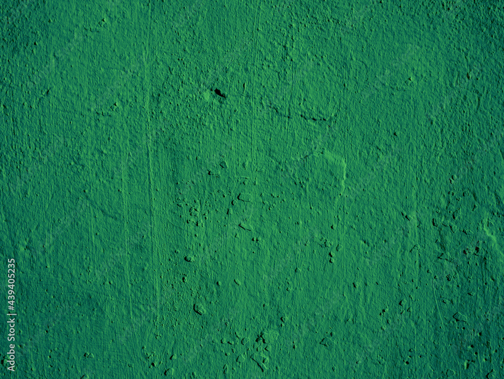 Beautiful green textured stucco on the wall. Background from green stucco... Beautiful green textured stucco on the wall. Background from green stucco...