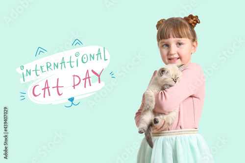 Girl with cute fluffy kitte...