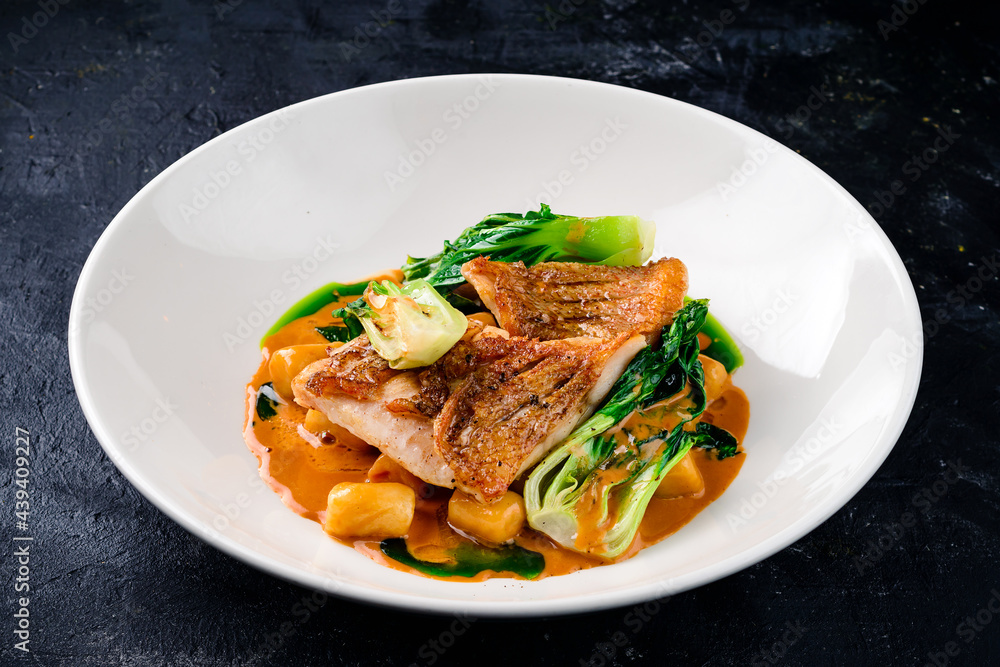 Snapper fish steak in white plate Snapper fish steak in white plate