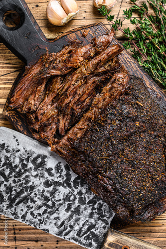 Homemade Smoked Barbecue Beef Brisket meat. wooden background. Top view