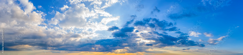 Amazing panoramic view of cloudy sky with sun rays Amazing panoramic view of cloudy sky with sun rays