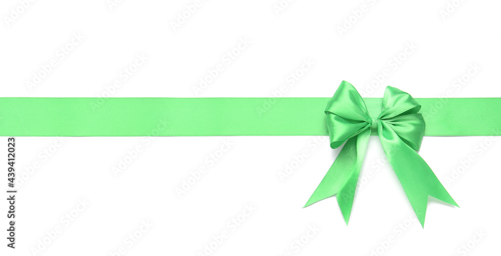 Beautiful green ribbon with bow on white background Beautiful green ribbon with bow on white background