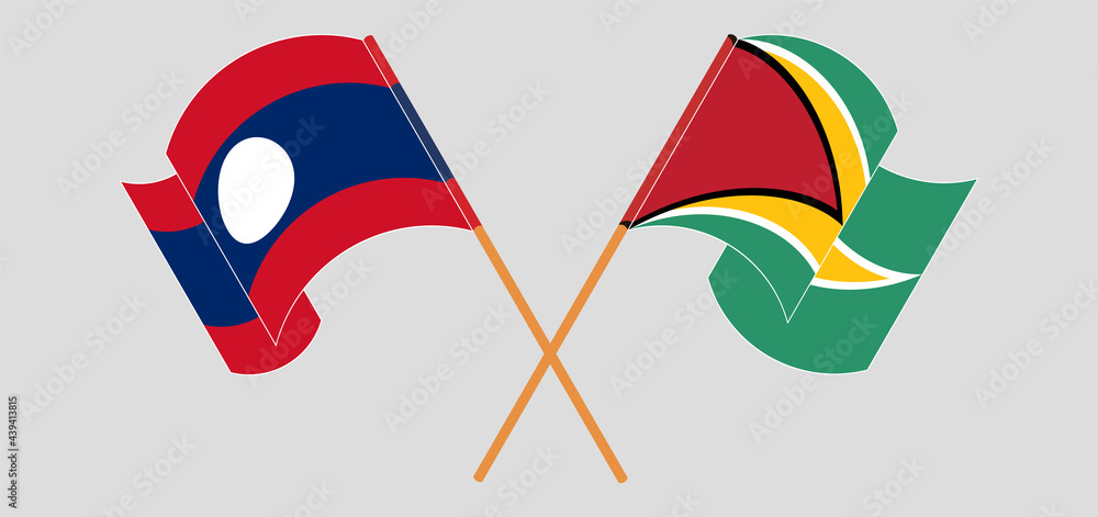 Crossed and waving flags of Laos and Guyana Crossed and waving flags of Laos and Guyana