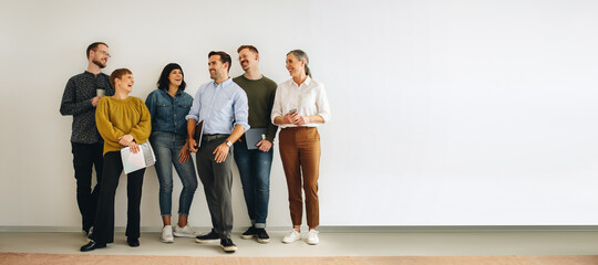 Diverse creative team looking happy