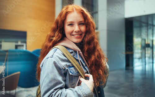 Bild auf Leinwand Young girl student going for class in high school