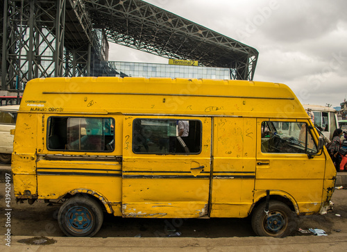 Quadro su tela Lagos yellow bus on the road - Danfo parked by the roadside in Oshodi