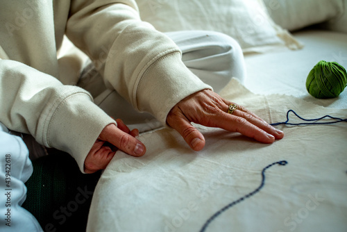 Hands-on the embroidery in process photo