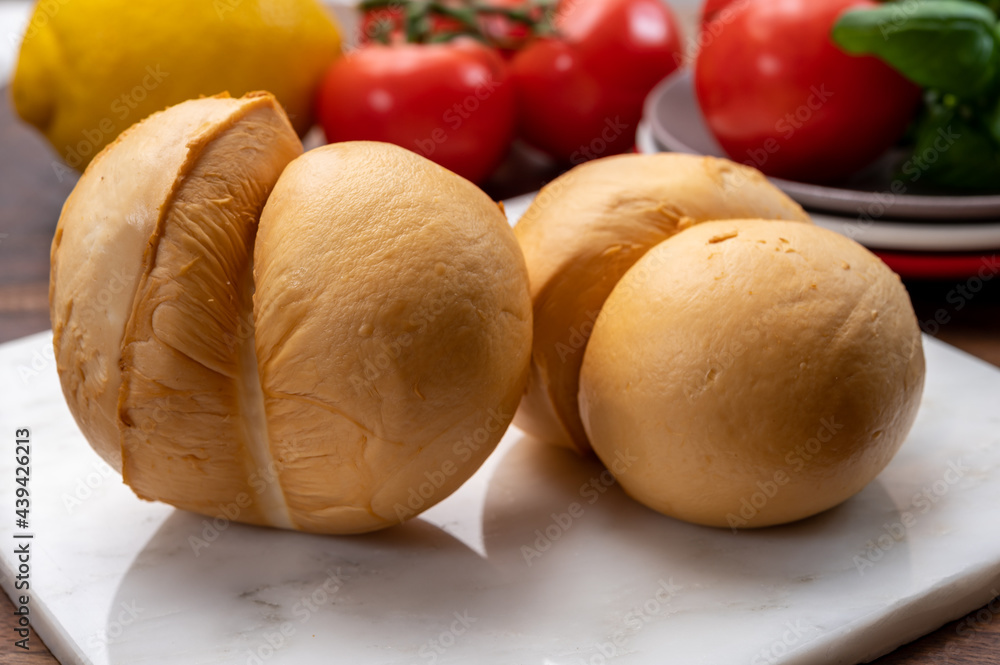 Cheese collection, Italian yellow smoked caciocavallo or scamorza cheese Cheese collection, Italian yellow smoked caciocavallo or scamorza cheese