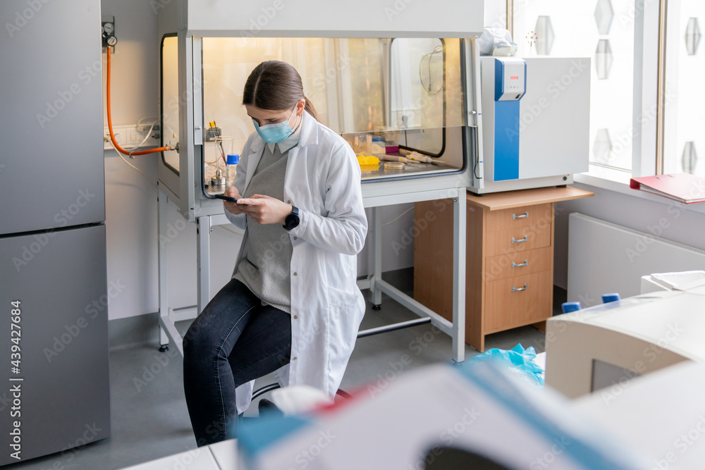 Scientist Using Mobile Phone Scientist Using Mobile Phone