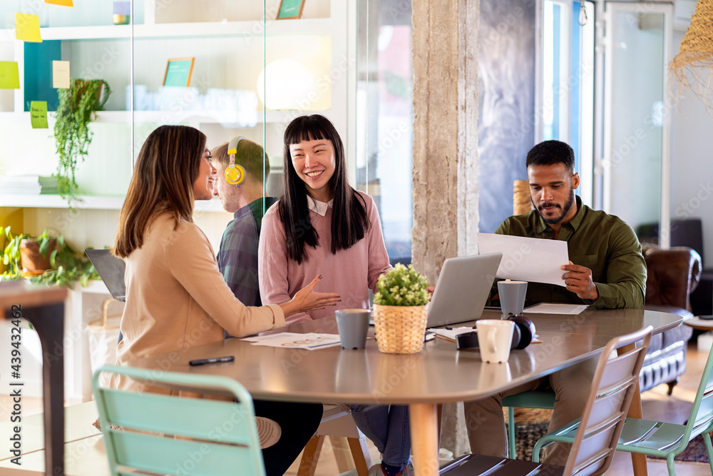 Portrait Of Coworkers Working Together In Office Portrait Of Coworkers Working Together In Office