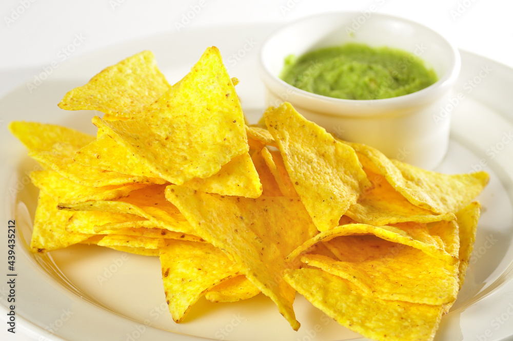 Nachos with salsa and sour cream dips Nachos with salsa and sour cream dips