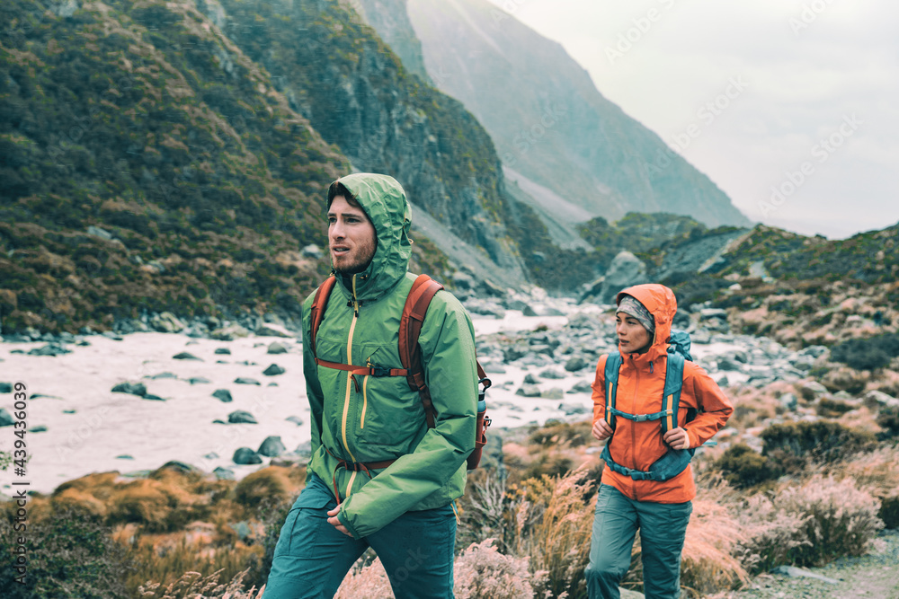 © Maridav - Hiking - hikers on trek with backpacks living healthy active lifestyle. Hiker girl walking on hike in mountain nature landscape © Maridav - Hiking - hikers on trek with backpacks living healthy active lifestyle. Hiker girl walking on hike in mountain nature landscape