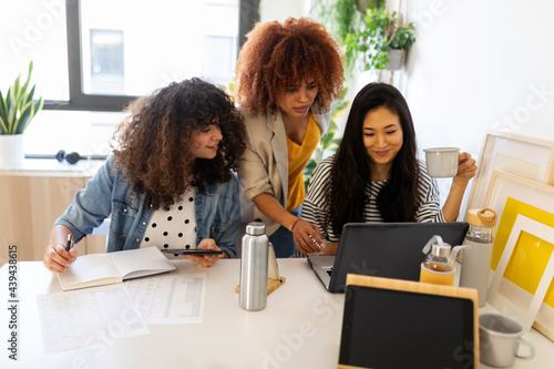 Female team  Working Together at office