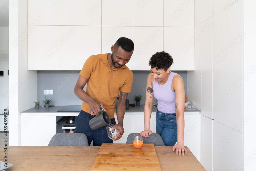 Couple Is Going To Drink Fresh Carrot Juice Couple Is Going To Drink Fresh Carrot Juice