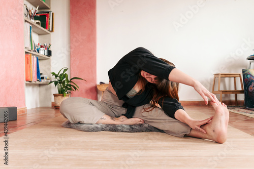 Stretching before yoga photo