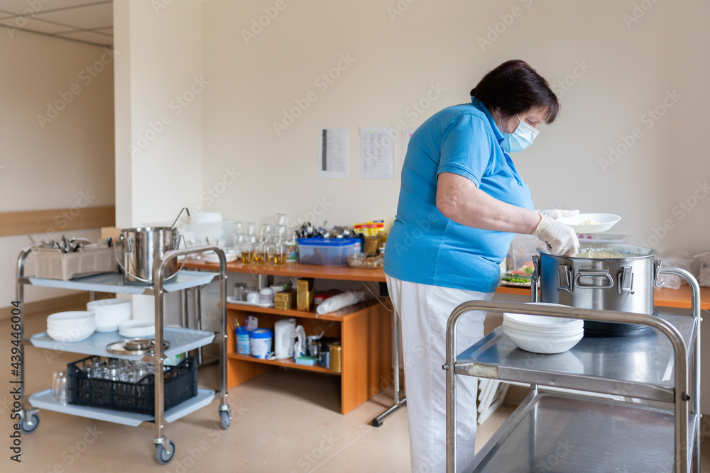 Nursing Home Worker Preparing Breakfast Nursing Home Worker Preparing Breakfast