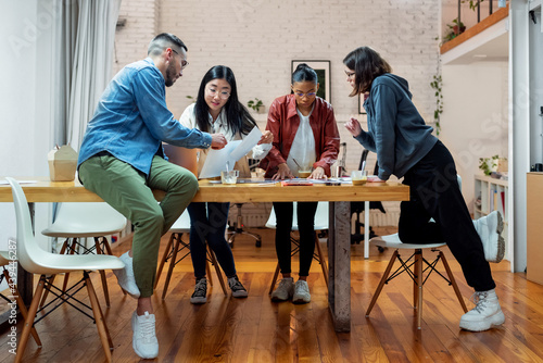 Diverse colleagues having a meeting  photo