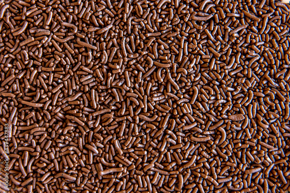Chocolate sprinkles texture background. Chocolate sprinkles texture background.