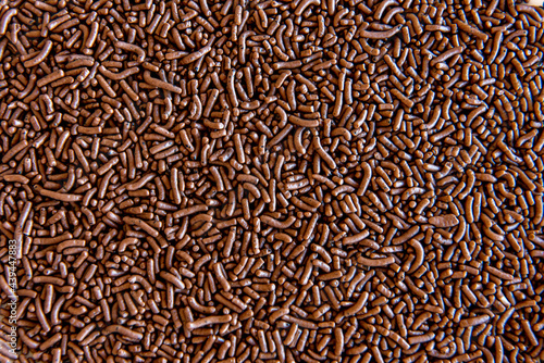 Chocolate sprinkles texture background.