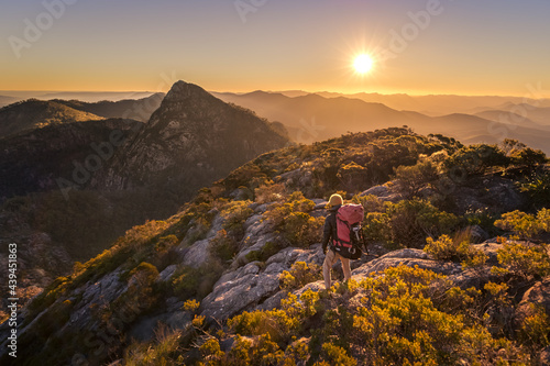 Backpacker hiking Mount Barney photo