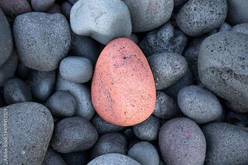 Smooth pink rock on the beach. Amed. Bali.  Indonesia. photo