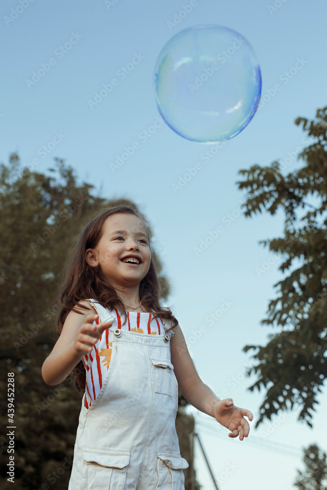 Cute, little girl in a countryside Cute, little girl in a countryside