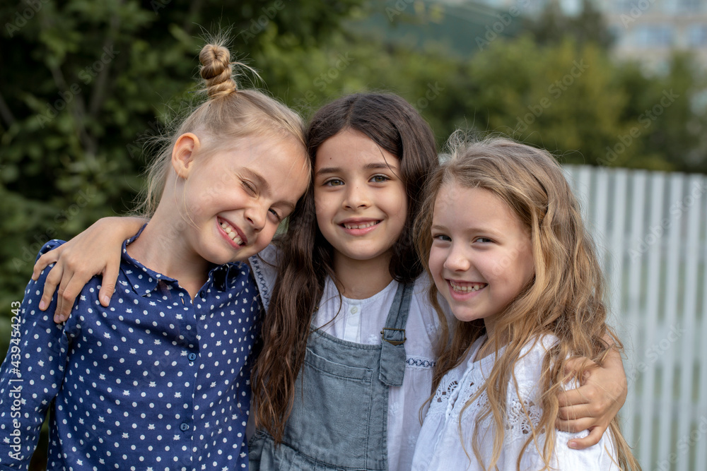 Three happy girls outdoors Three happy girls outdoors