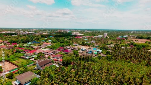 View of the surrounding landscape looking out from the top of Wat Samphran Dragon Temple, Sam Phran province Thailand photo