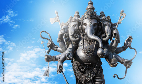 Ganesha black has an old power in a religious place that is separated smoky colors from behind the power of belief