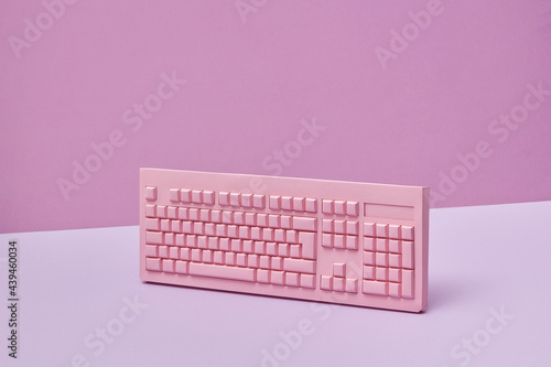 Computer keyboard handmade from pink paper. photo