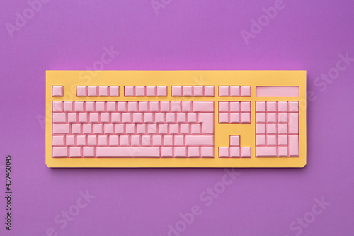 Computer papercraft keyboard from colored paper. photo