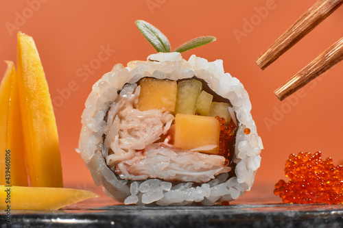asian cuisine sushi restaurant rice rolls with fish photo