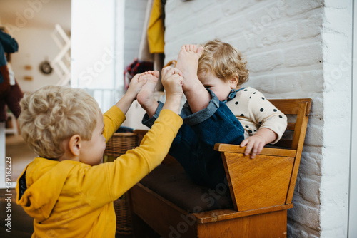 kids teasing each other at home