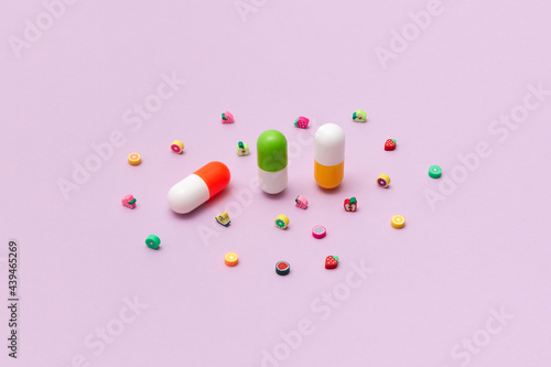 Capsules on pink photo