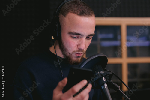 Male singer recording and creating music and songs  photo