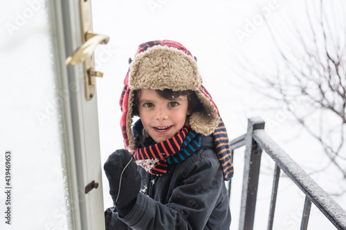 boy outside in snow photo