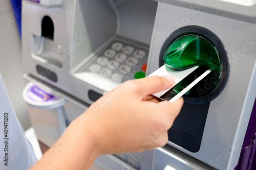 Bilde på lerret Woman make a withdrawal at cabinet which having banknotes for travel and shopping