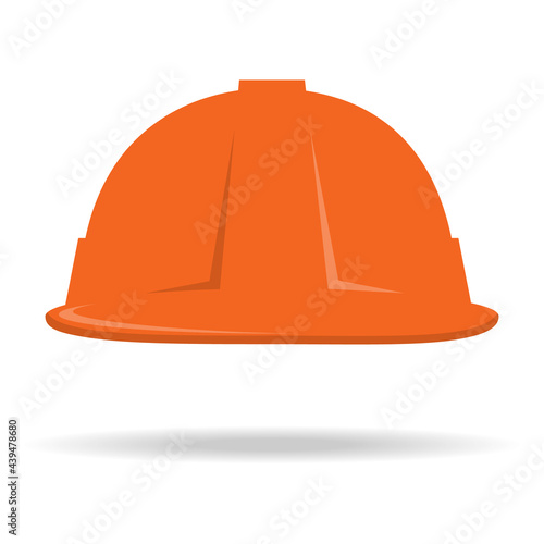 Construction helmet icon. An orange construction helmet with a shadow under it. Vector, cartoon illustration. Vector.