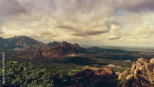 drone flying over a peak, with beautiful view on the valley