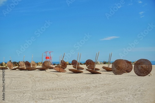 Beach with umbrellas on the shores of the Black Sea.  The ideal place to relax and spend wonderful moments.