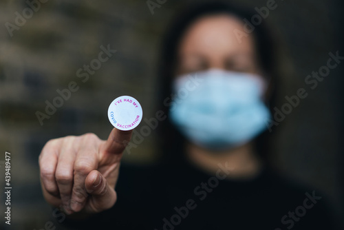 Woman who has been vaccinated against covid-19 photo