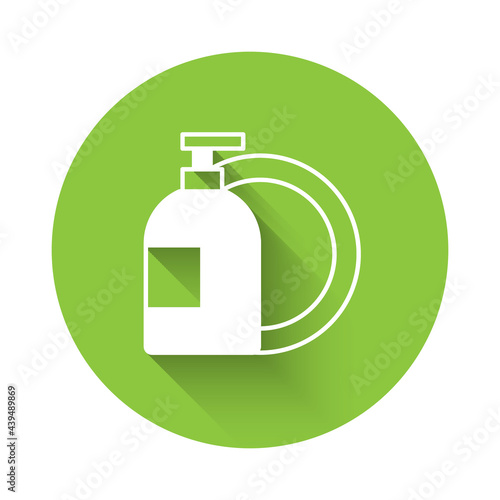 White Dishwashing liquid bottle and plate icon isolated with long shadow background. Liquid detergent for washing dishes. Green circle button. Vector